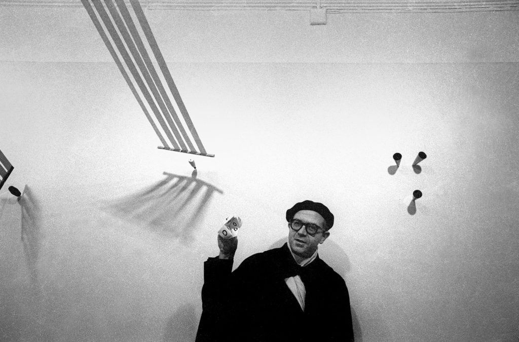 Dom Sylvester Houédard at Signals Gallery 1964 Photograph © Clay Perry, courtesy England & Co Gallery London.